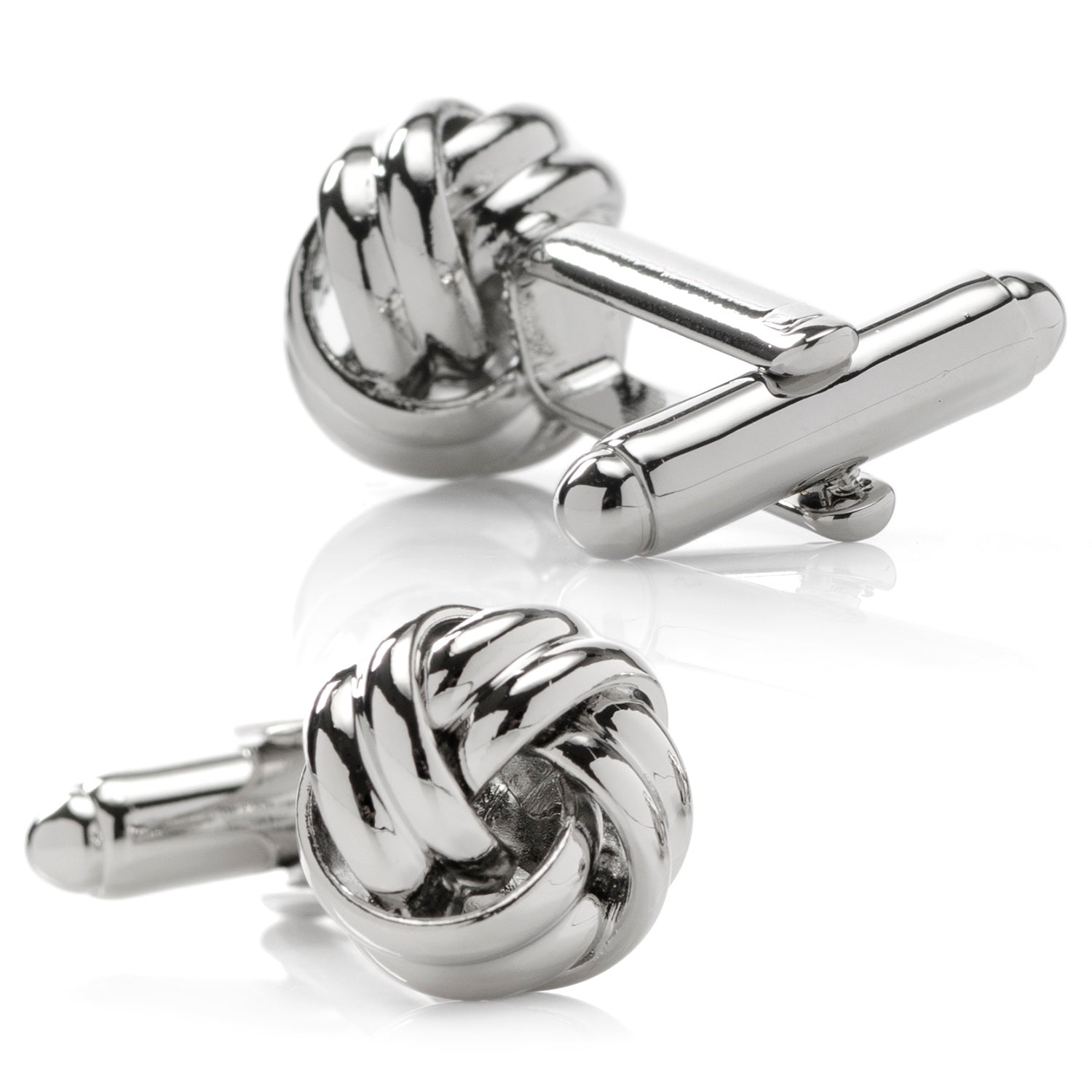 A classic knot design with an elegant silver tone finish, the Silver Knot Stud Set features a pair of cufflinks and matching tuxedo studs that are the perfect accessories for formal events. A popular item for weddings year-round, keep the groom and his groomsmen looking sharp on your big day. Pair with a black bow tie for an elegantly classic look that never goes out of style. Image 5