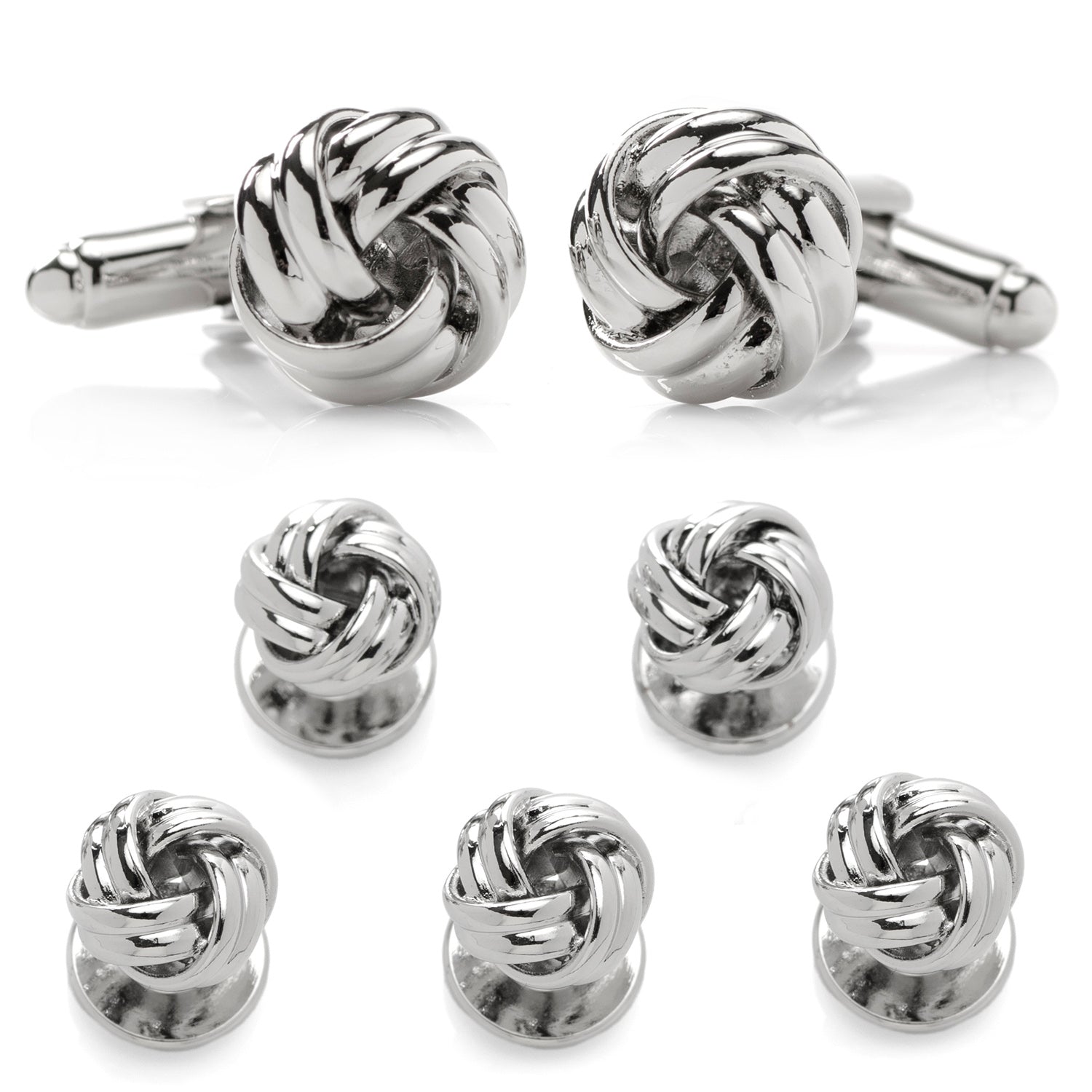 A classic knot design with an elegant silver tone finish, the Silver Knot Stud Set features a pair of cufflinks and matching tuxedo studs that are the perfect accessories for formal events. A popular item for weddings year-round, keep the groom and his groomsmen looking sharp on your big day. Pair with a black bow tie for an elegantly classic look that never goes out of style. Image 1
