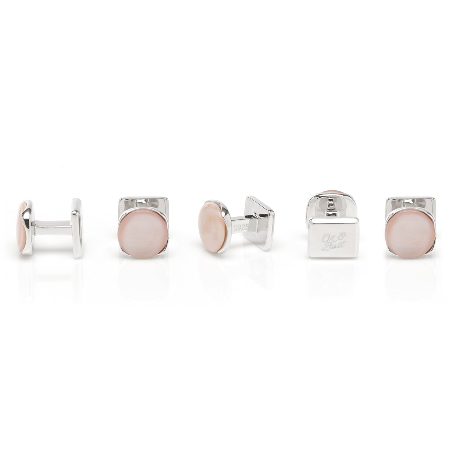 Beautiful creamy pink mother of pearl has been cut into a cushioned disc and surrounded in shiny sterling silver, to create this elegant set of cufflinks and tuxedo studs. Cufflinks feature round logo swivel closures for ease of dressing, and the studs have soft-edged fixed backings to keep them in place all night long. Perfect for any spring or summer formal occasions. Includes gift box. Image 3