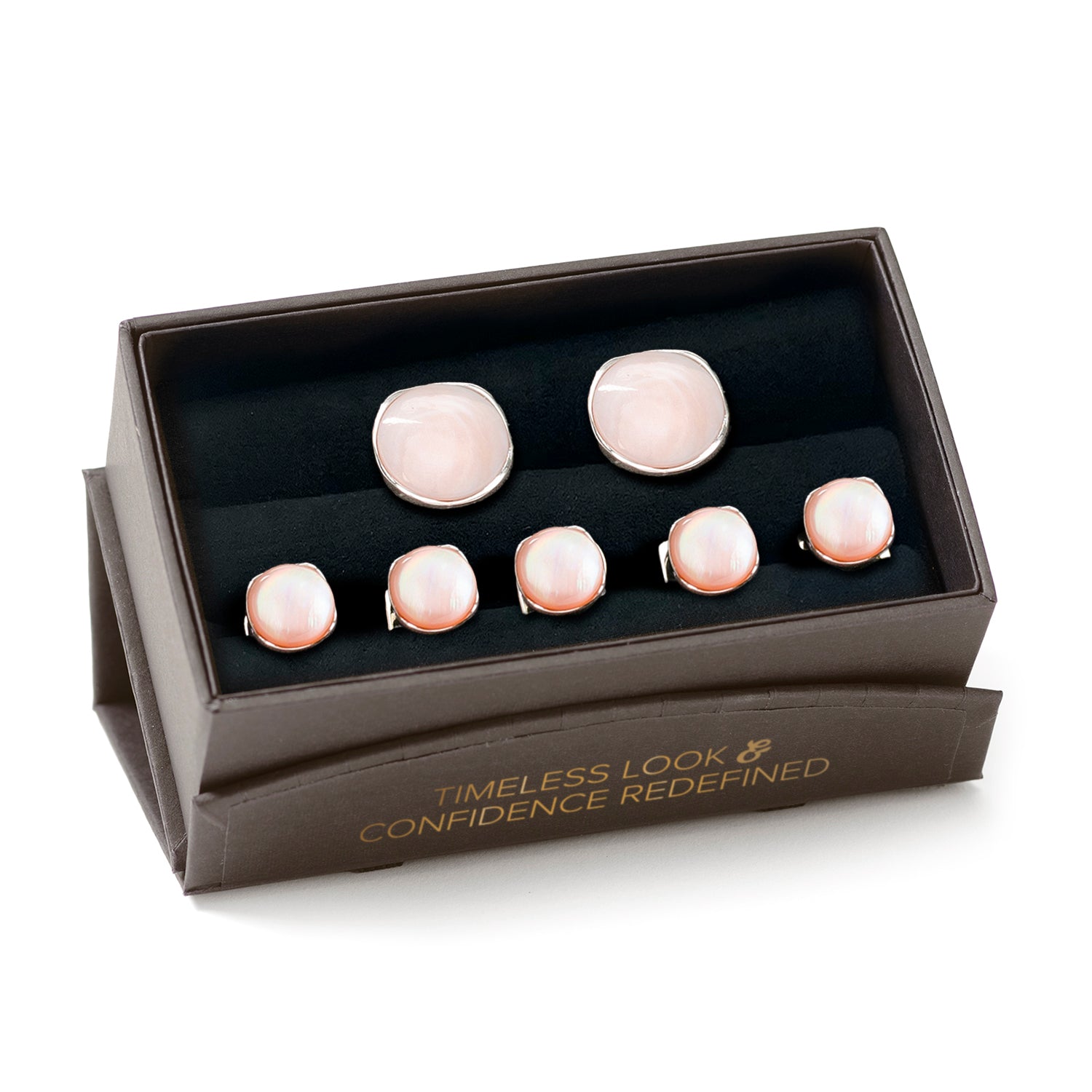 Beautiful creamy pink mother of pearl has been cut into a cushioned disc and surrounded in shiny sterling silver, to create this elegant set of cufflinks and tuxedo studs. Cufflinks feature round logo swivel closures for ease of dressing, and the studs have soft-edged fixed backings to keep them in place all night long. Perfect for any spring or summer formal occasions. Includes gift box. Image 7