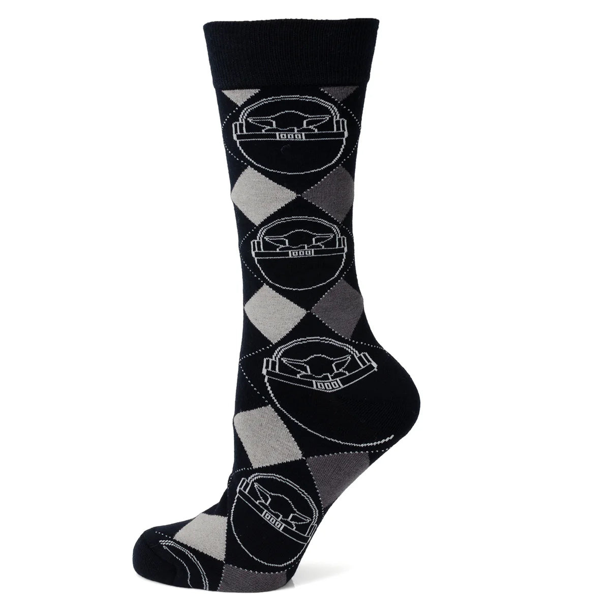 Embrace the charm of the galaxy's favorite foundling with the Grogu Argyle Charcoal Gift Set. This delightful set includes a pair of charcoal argyle socks featuring an adorable image of Grogu and a matching lapel pin. Perfect for the Star Wars fan who adores "The Mandalorian," these accessories blend classic style with whimsical appeal. Showcase your love for Grogu with every step and detail. Image 2