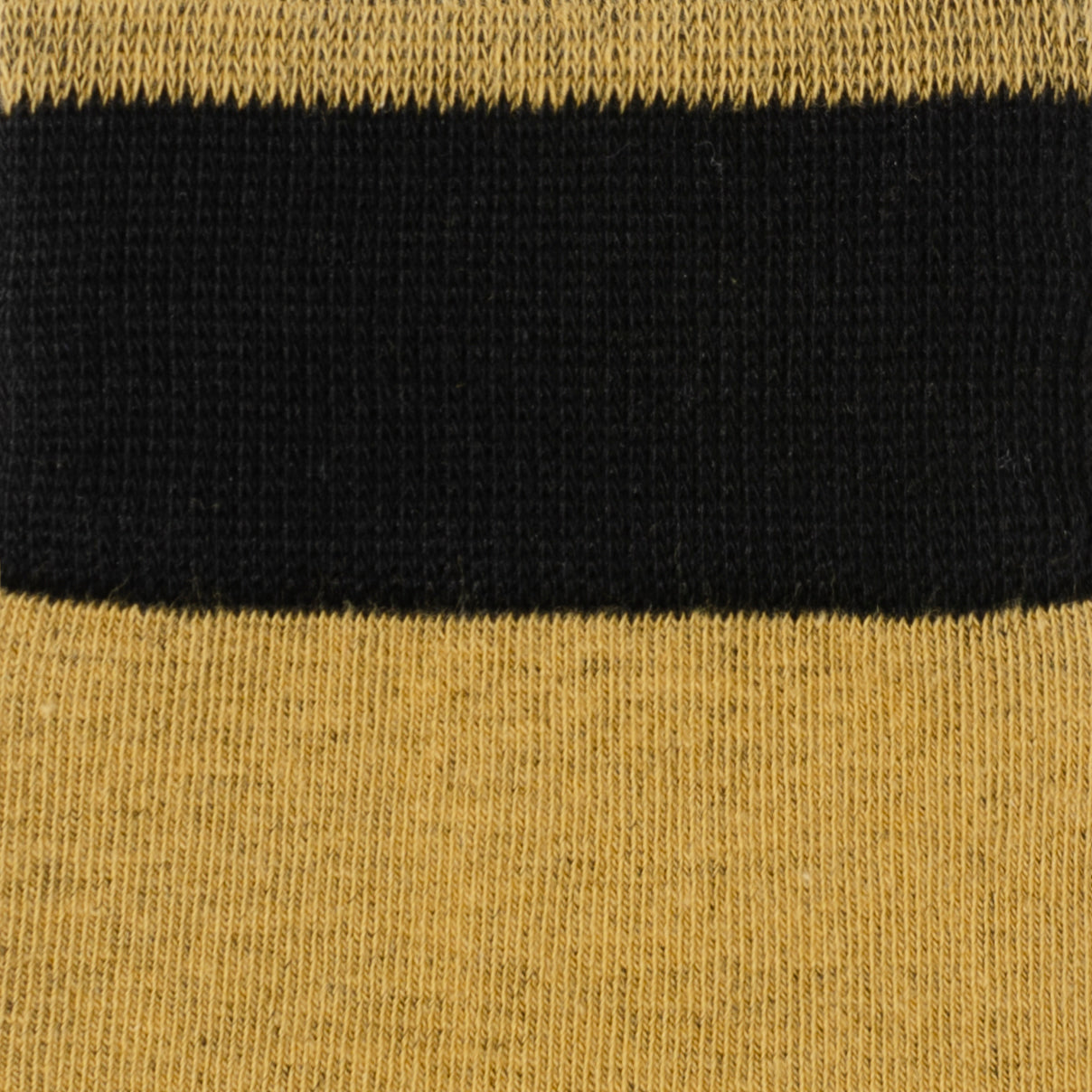 Celebrate the iconic droid duo with the R2D2 and C3PO Black Gift Set. This charming set includes a pair of black and yellow socks featuring the beloved C3PO, along with our R2D2 Lapel Pin. Perfect for the Star Wars fan who cherishes these classic characters, these accessories add a touch of nostalgic elegance to any outfit. Showcase your love for the galaxy's favorite droids with every step and detail. Image 3