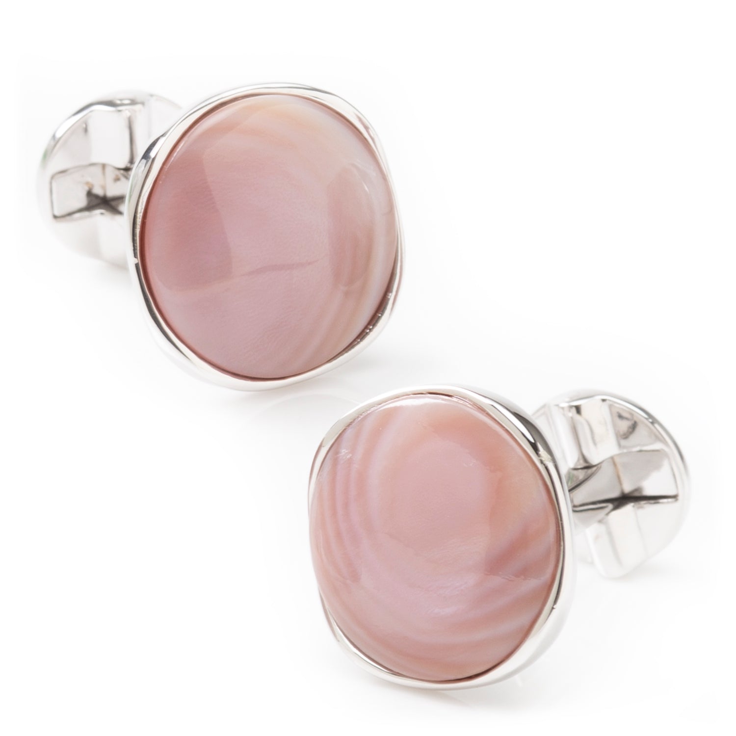 Beautiful creamy pink mother of pearl has been cut into a cushioned disc and surrounded in shiny sterling silver, to create this elegant set of cufflinks and tuxedo studs. Cufflinks feature round logo swivel closures for ease of dressing, and the studs have soft-edged fixed backings to keep them in place all night long. Perfect for any spring or summer formal occasions. Includes gift box. Image 4