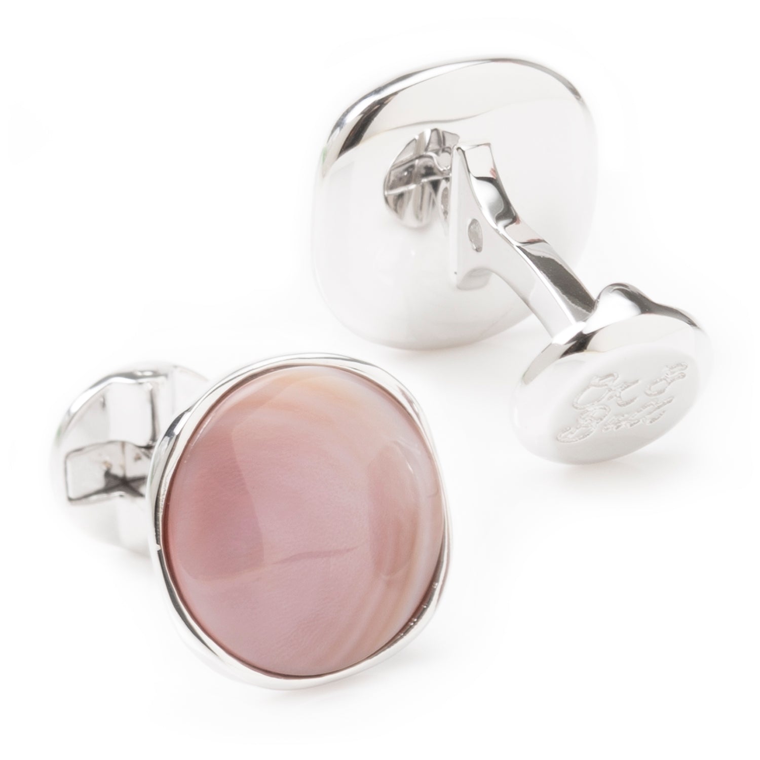 Beautiful creamy pink mother of pearl has been cut into a cushioned disc and surrounded in shiny sterling silver, to create this elegant set of cufflinks and tuxedo studs. Cufflinks feature round logo swivel closures for ease of dressing, and the studs have soft-edged fixed backings to keep them in place all night long. Perfect for any spring or summer formal occasions. Includes gift box. Image 5